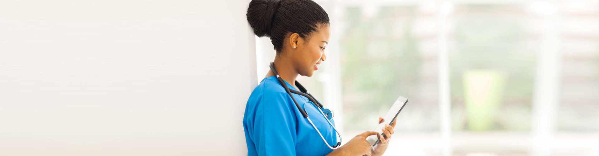 nurse using tab devices