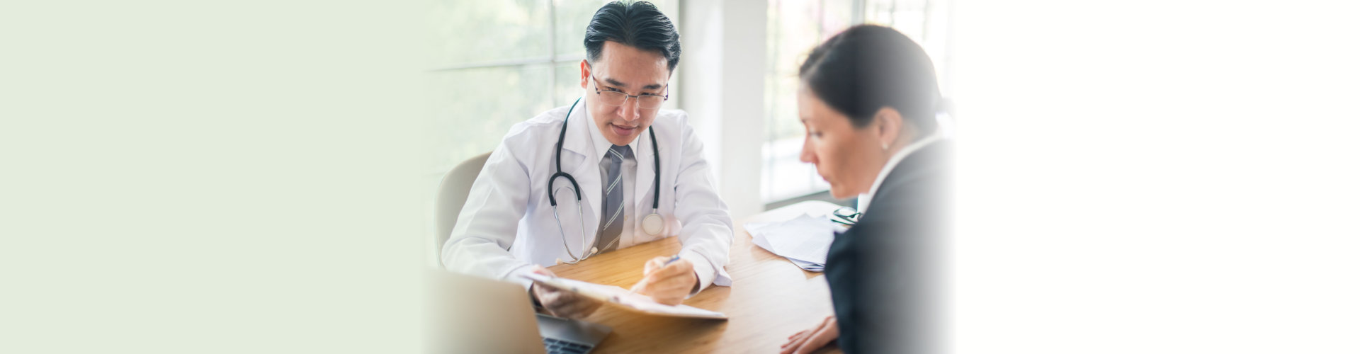 doctor and woman on the table