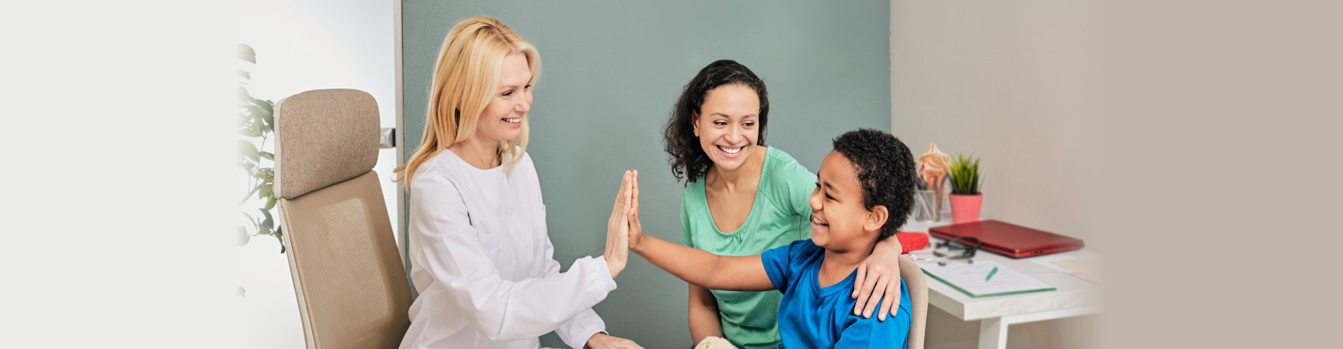 nurse and child smiling